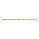 An 18ct gold link bracelet set with emeralds and diamonds, approx 12.6g.