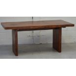 A contemporary hardwood rectangular coffee table on block supports, 174 x 90cm.