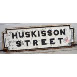 A vintage cast iron street sign for 'Huskinsson Street' Liverpool, length 110cm.