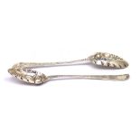 A pair of Victorian hallmarked silver berry spoons with engraved twist decoration to neck and