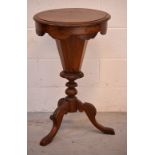 A 19th century walnut sewing table,