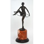 A large hot cast bronze Art Deco style figure of a female dancer on a marble base, signed D.