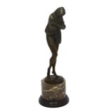 A large bronze Art Deco style figure of a nude female with shawl covering head and shoulders,