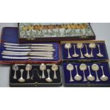 A quantity of silver spoon sets to include a cased set of twelve Swedish silver teaspoons,