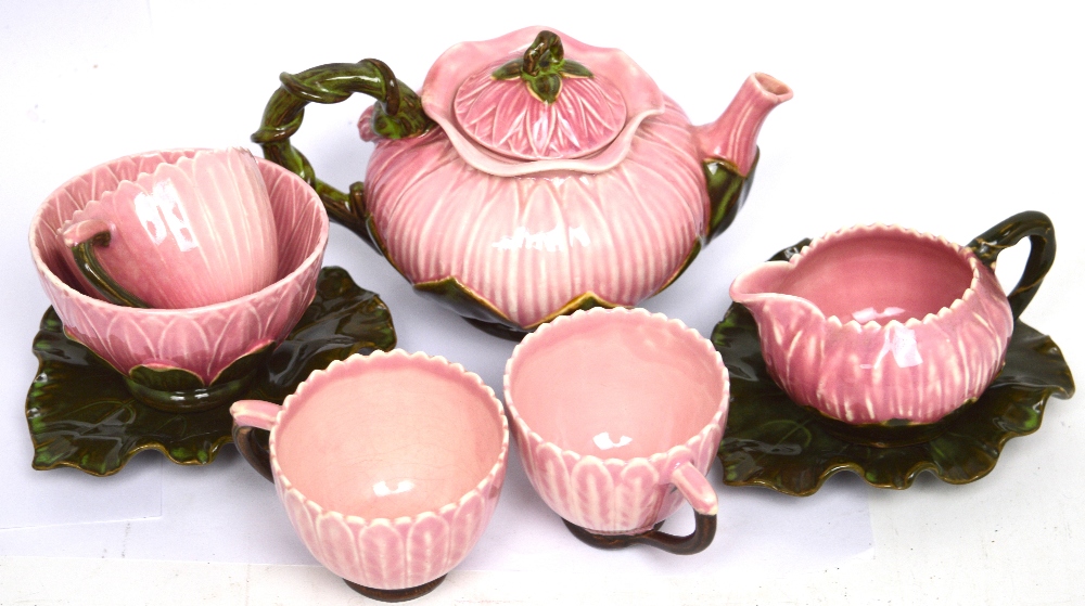 A Zsolnay Pecs pink flower-shaped tea service to include a small teapot,