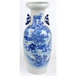 A large 19th century Chinese baluster vase with raised rim painted in underglaze blue with