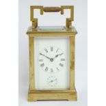 A circa 1900 brass carriage clock,