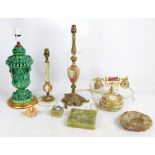 A group of various onyx desk items, including telephone, two lamps and a lighter,