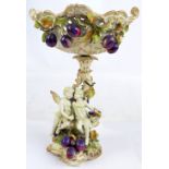 A late 19th century/early 20th century German porcelain centrepiece with pierced twin handled