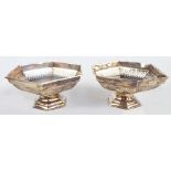 WALKER & HALL; a pair of George V hallmarked silver hexagonal pierced & footed bonbon dishes,