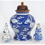 A late 19th century Chinese porcelain baluster vase painted in underglaze blue with blossoming