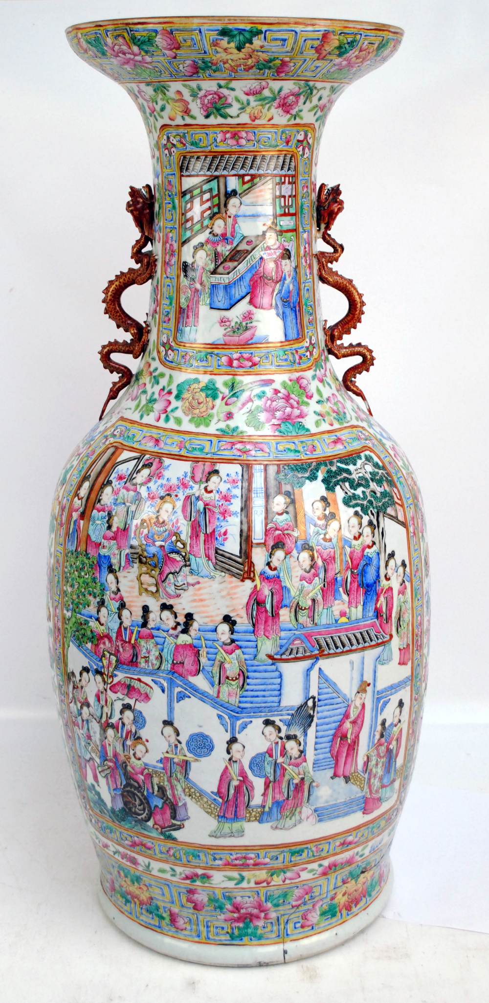 A very large 19th century Chinese Canton Famille Rose baluster vase with flared rim and twin gilt