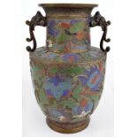 A circa 1900 Chinese bronze and champlevé enamel baluster vase with twin mythical beast mask