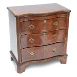 A late 19th century burr walnut and crossbanded serpentine chest of drawers,