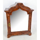 A late 19th century walnut veneered table top cabinet with single arched and mirrored door