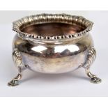 MAPPIN & WEBB; a George V hallmarked silver open circular salt with cast shaped rim,