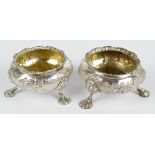 A near pair of Victorian open salts with engraved lattice and foliate scroll decoration and scallop