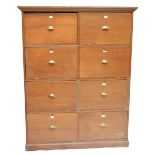 A mahogany linen chest with two formations of four drawers,