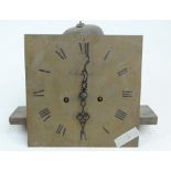 An early 19th century longcase clock eight days movement and square brass dial set with Roman