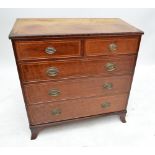 A 19th century crossbanded mahogany chest of two short and three long drawers on bracket feet (for