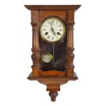 JUNGHANS; a small early 20th century Vienna style wall clock,