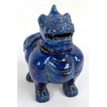 A 19th century Chinese blue glazed incense burner modelled as a Dog of Fo, unmarked, height 15cm.