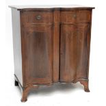 A George III mahogany and crossbanded serpentine side cabinet,