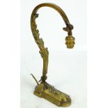 A circa 1900 brass adjustable lamp, with square sectioned foliate decorated scrolling branch,