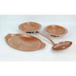 Four copper items comprising twin handled oval serving tray, two bowls and a sifting ladle (4).