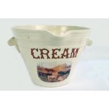 A circa 1900 English white glazed cream pail with moulded handles and lip and with transferred