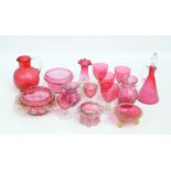 A small quantity of cranberry glass to include a set of four wine glasses and two smaller examples,