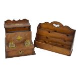 An Edwardian oak desk top stationery compendium including two ink bottles and a contemporary five