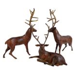 Three modern decorative metal figures of stags, the tallest height 43cm.