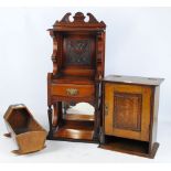 An early 20th century oak smoker's cabinet,