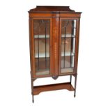 An Edwardian inlaid mahogany display cabinet,