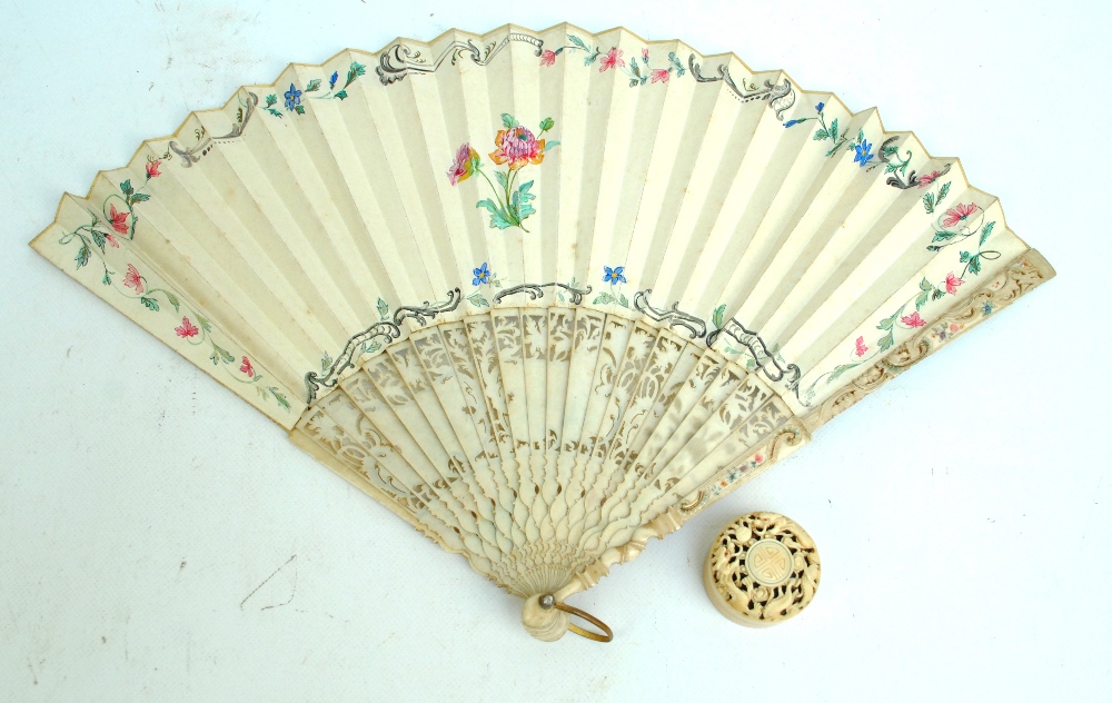 A late 19th/early 20th century fan with paper leaf decorated with a watercolour depicting a