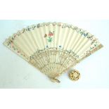 A late 19th/early 20th century fan with paper leaf decorated with a watercolour depicting a