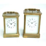 A late 19th century repeating brass carriage clock with swing loop handle,