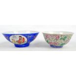 An early 20th century Chinese porcelain circular bowl painted in enamels with four figural roundels