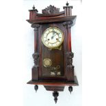 JUNGHANS; a circa 1900 eight day spring driven stained beech wall clock,