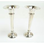 LEVI & SALAMAN; a pair of George V hallmarked silver trumpet vases with flared rims,