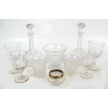 A small quantity of clear cut glass to include a pair of bottle decanters,