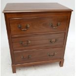 A mahogany chest of three long drawers on block feet, width 76cm.