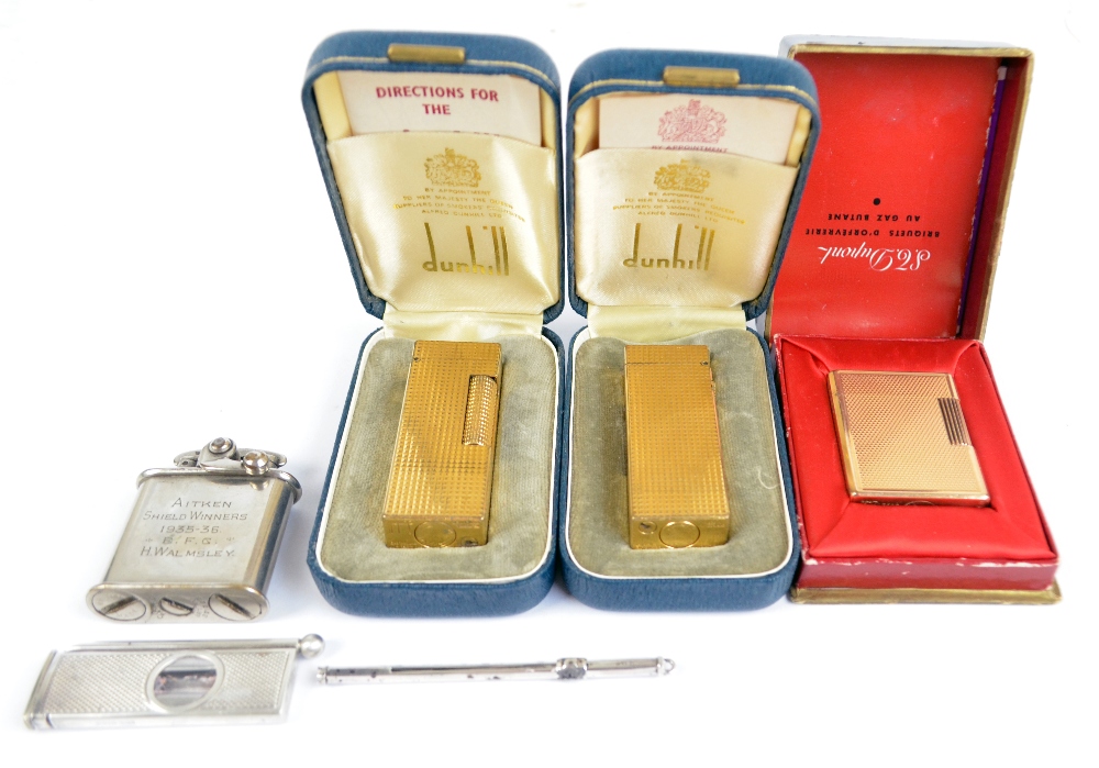 Two Dunhill 'Rollagas' gold plated lighters, a Dupont example,