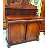 A Victorian mahogany sideboard, two cupboard doors to base with recessed panels,