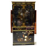 A 20th century Oriental black lacquer display cabinet,