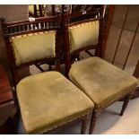 A pair of Edwardian mahogany dining chairs with bobbin spindle and padded back,