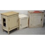 Two vintage pine white-painted cupboards, both on plinth base,