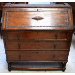 A 1930s oak bureau base,