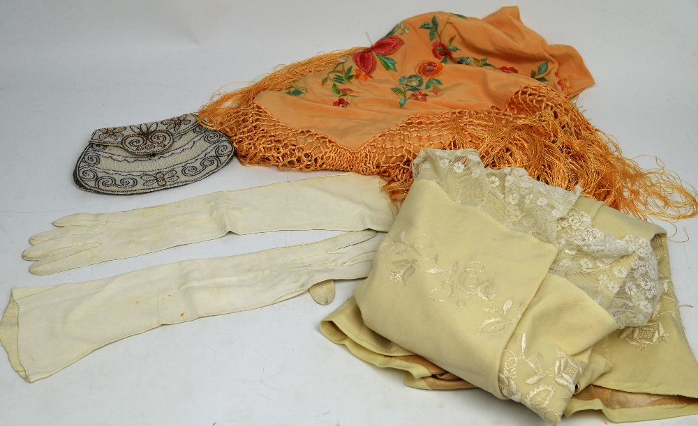 A small quantity of vintage textiles to include an Edwardian babies' wool,